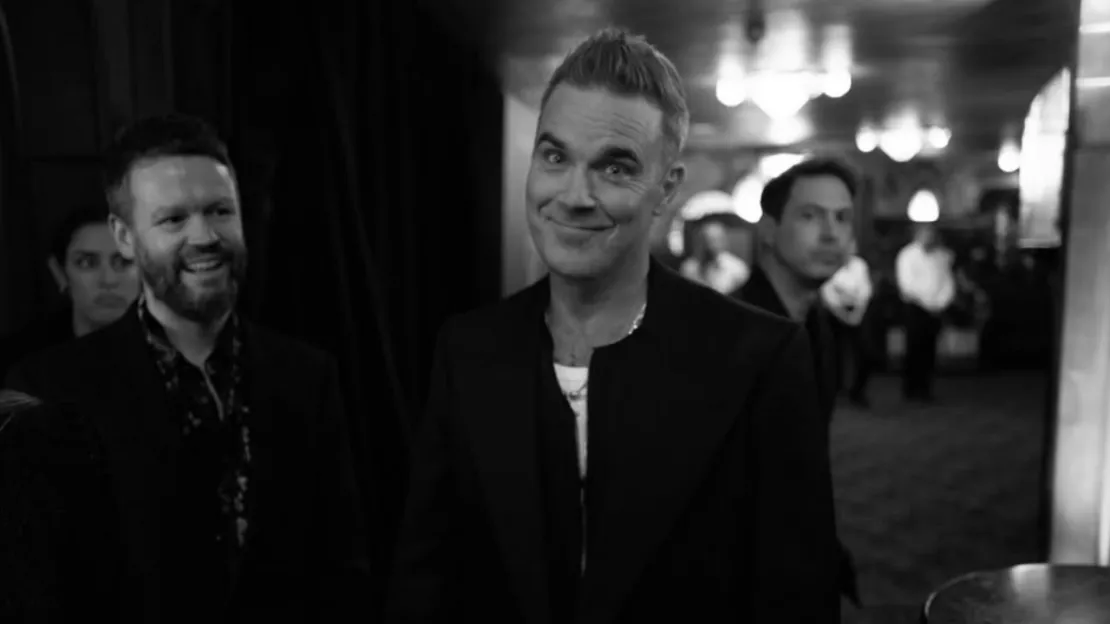 Quand Robbie Williams se remémore un moment (plus ou moins) mémorable avec Bono de U2 !